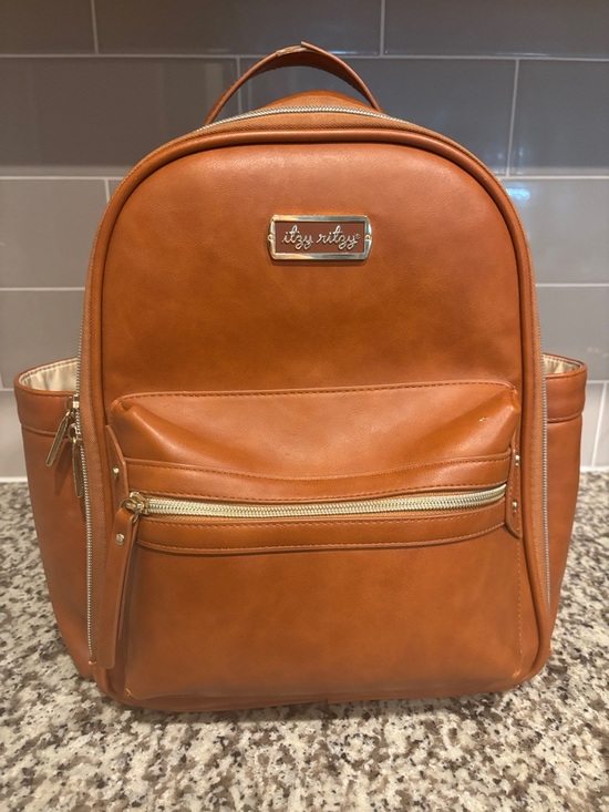 Itzy Ritzy Handbags - Itzy Ritzy Men's Cognac/Tan Faux Leather Backpack with Gold Hardware